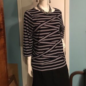 Navy and white Chico’s top. Size 2